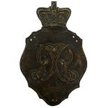 A GEORGIAN SHAKO PLATE, the crowned shield shaped plate with central GR cypher, together with a