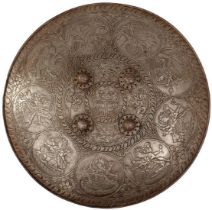 A LATE 19TH/EARLY 20TH CENTURY CHISELLED STEEL INDIAN DHAL OR SHIELD, 54.5cm diameter with turned