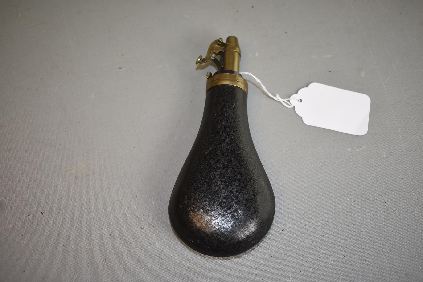 A 20TH CENTURY RIFLE FLASK BY DIXON & SONS, the leather covered body with adjustable sprung top. - Image 2 of 6