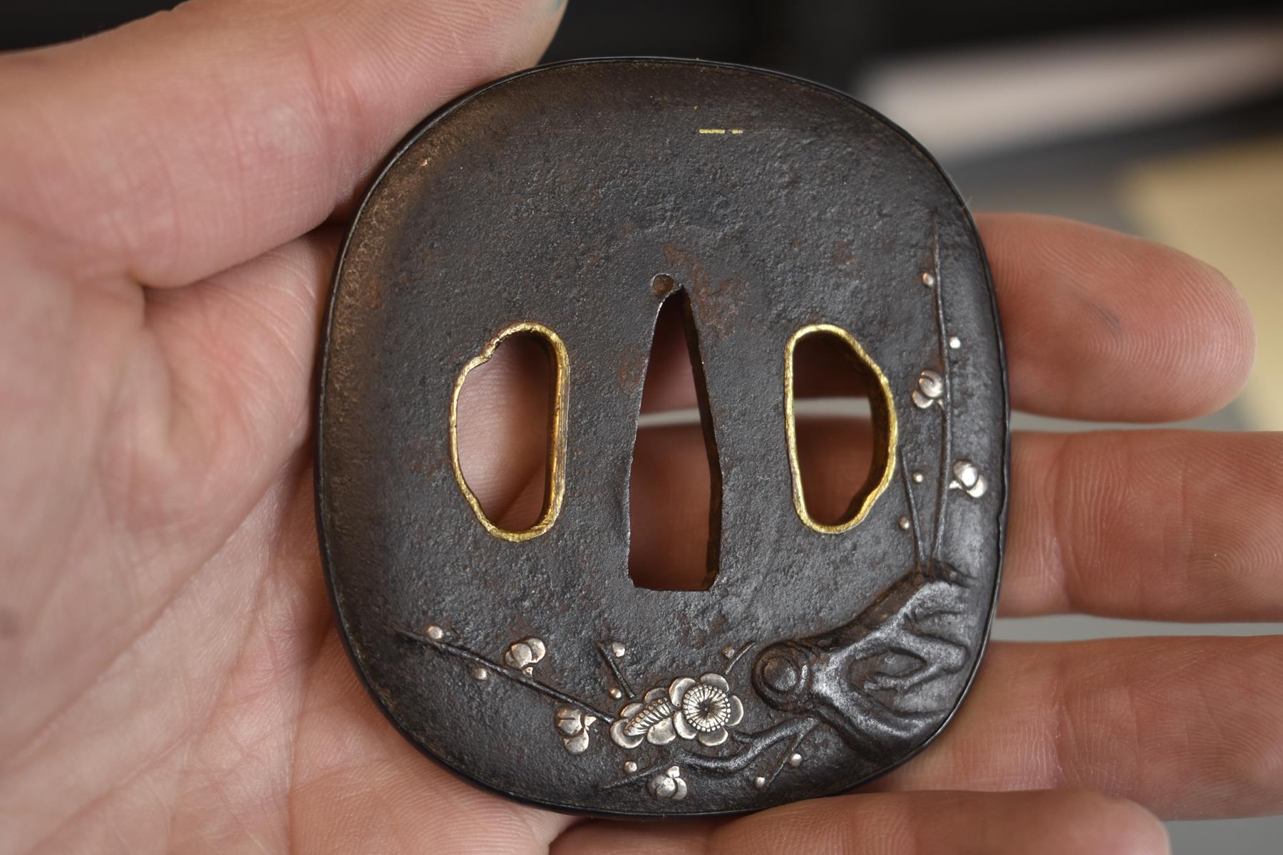 A ROUNDED SQUARE IRON TSUBA, decorated with prunus blossom in silver, gold lined hitsu-ana, - Image 3 of 4