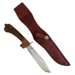 A SCARCE WILKINSON SWORD RJH JUNGLE KNIFE, 20cm clipped back fullered blade etched to one side RJH