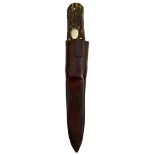 AN ARMY & NAVY FOLDING BOWIE KNIFE, contained in its leather sheath, together with a collection of