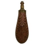 A GOOD QUALITY CONTINENTAL COPPER POWDER FLASK, bag-shaped body embossed with foliage and basket