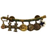 A RUSSIAN CIVIL WAR PRESENTATION SET OF MINIATURE MEDALS AND AWARDS, the enamelled gilt sabre