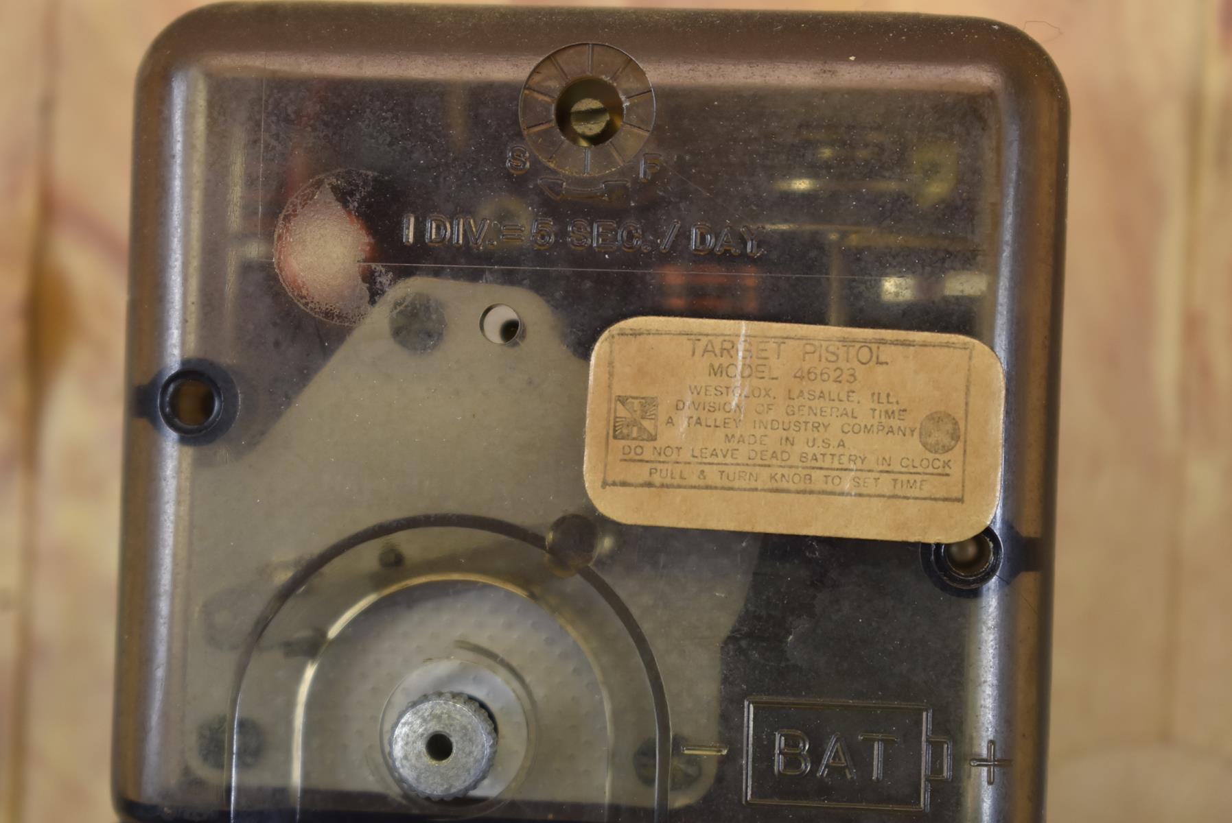 A WESTCLOX MARKSMANSHIP AWARD CLOCK, depicting a Colt Army revolver in front of a target, battery - Image 5 of 5