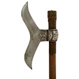 A GOOD QUALITY 19TH CENTURY INDIAN AXE, 22cm polished iron moustache-shaped head lateral ridge,