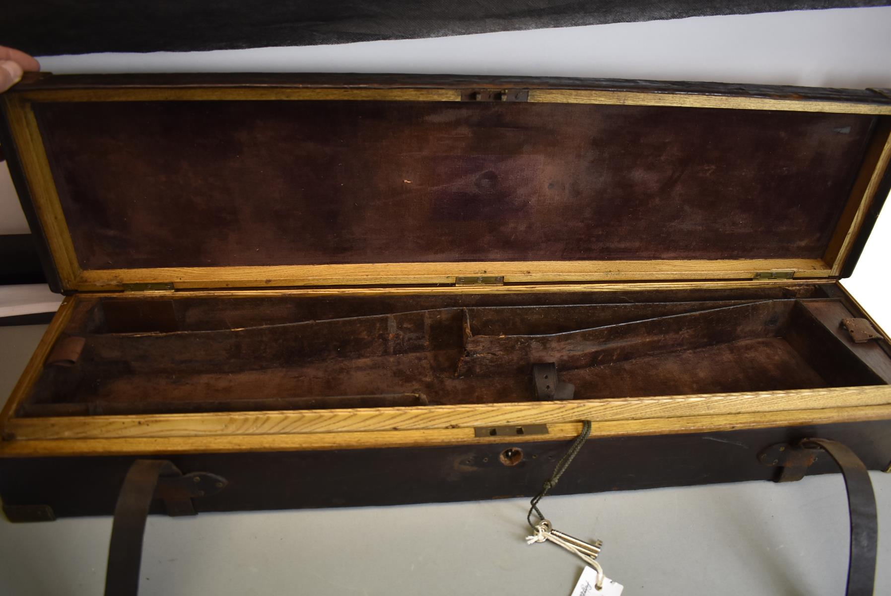 A LEATHER COVERED OAK GUN CASE, for a gun with 30.5inch barrels, the purple velvet lined interior - Image 3 of 4