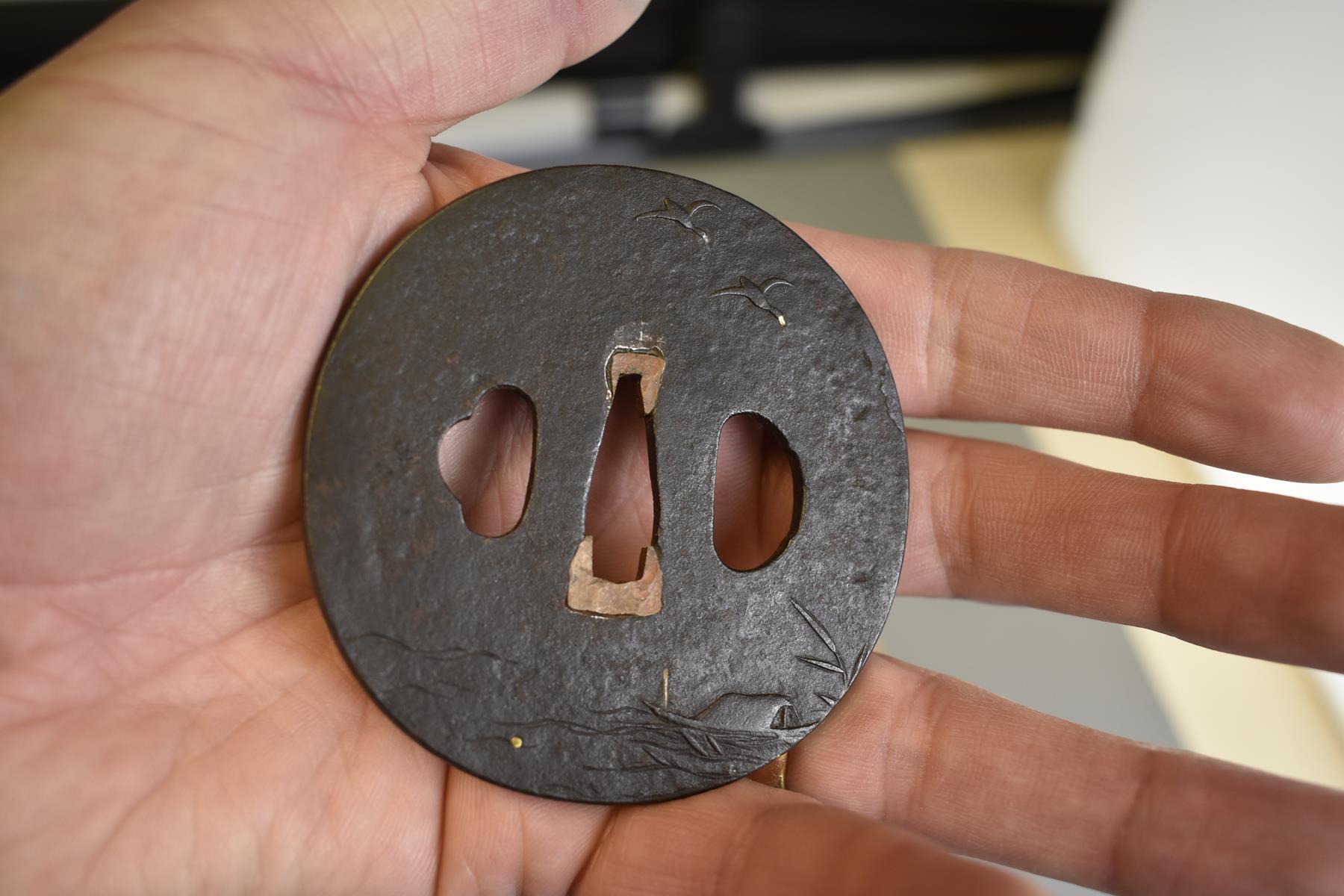 THREE CIRCULAR IRON TSUBA, the first chiselled with a landscape, soft metal details, the second with - Image 6 of 8