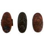 THREE PAIRS OF FUCHI-KASHIRA, the first of copper decorated with huts in shakudo within a landscape,