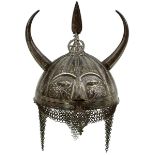 A FINE 19TH CENTURY INDIAN DEVIL'S HEAD KULAH KHUD OR HELMET, the bowl embossed with sixteen