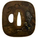 A ROUNDED SQUARE YAMAGANE TSUBA, decorated with the figure of Fukurukuju in a landscape, shibuichi