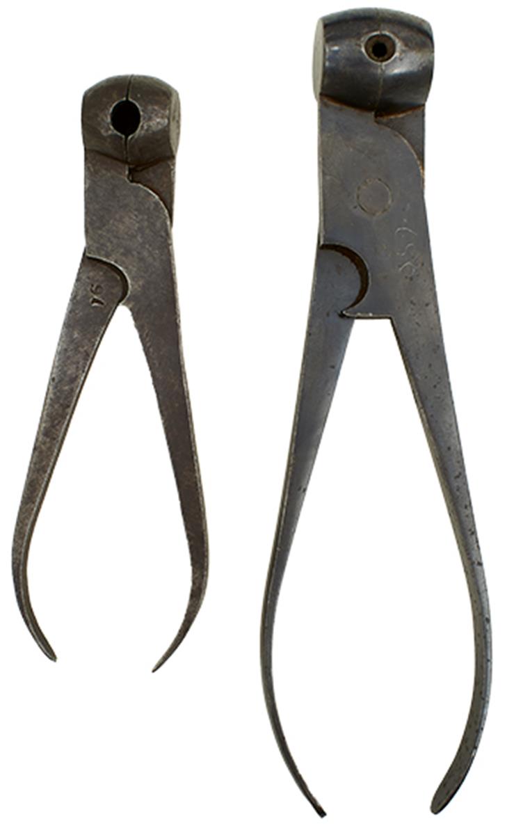 A 16-BORE SCISSORS BALL MOULD, together with another similar. (2)