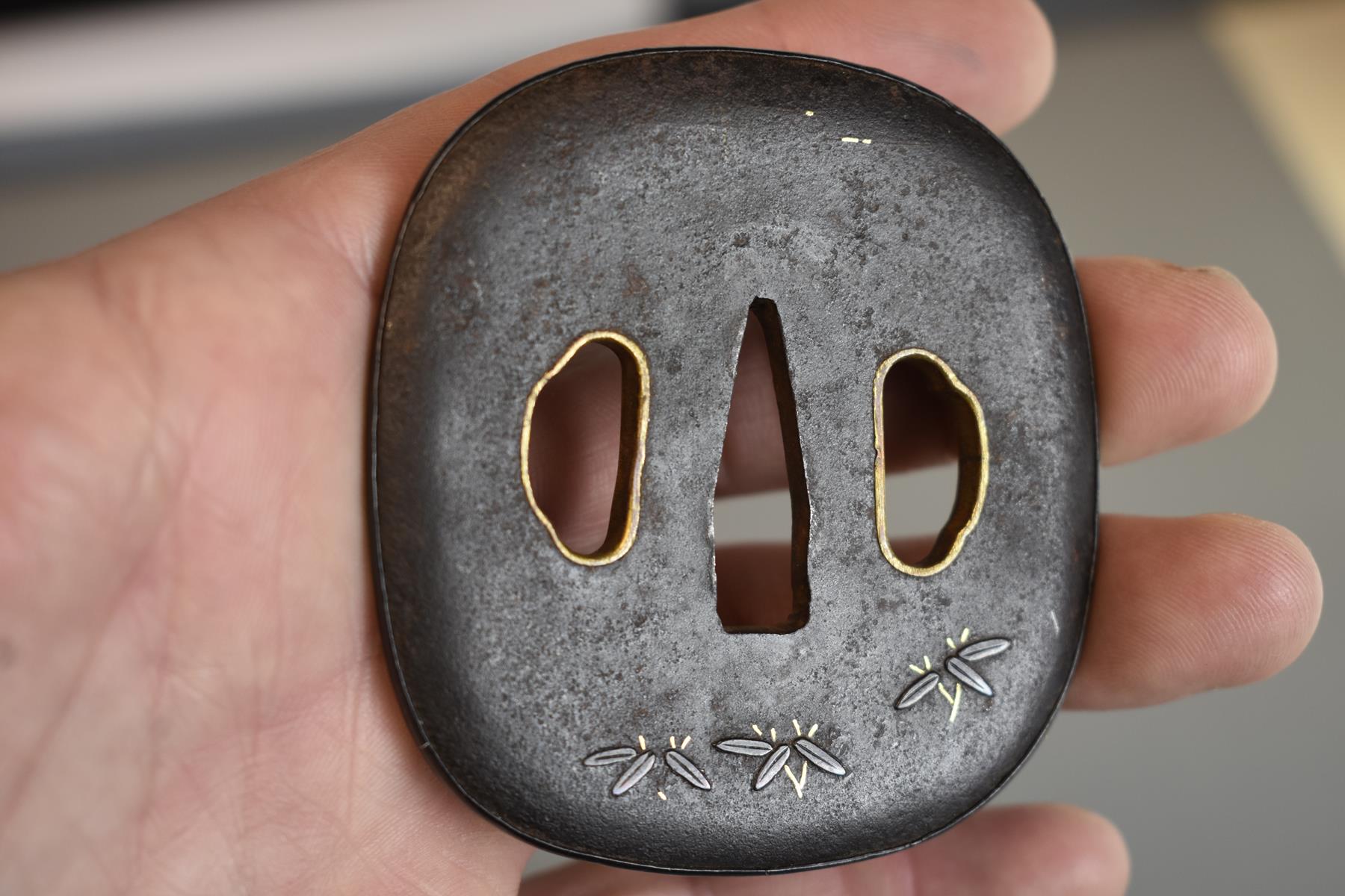 A ROUNDED SQUARE IRON TSUBA, decorated with prunus blossom in silver, gold lined hitsu-ana, - Image 4 of 4