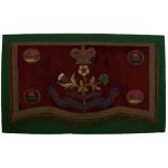 A VICTORIAN DRUM BANNER TO THE MONTGOMERYSHIRE YEOMANRY CAVALRY, the shaped red velvet body with