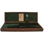 A WESTLEY RICHARDS SPORTING GUN OR RIFLE CASE, the brass bound oak case for a gun with 30.5inch