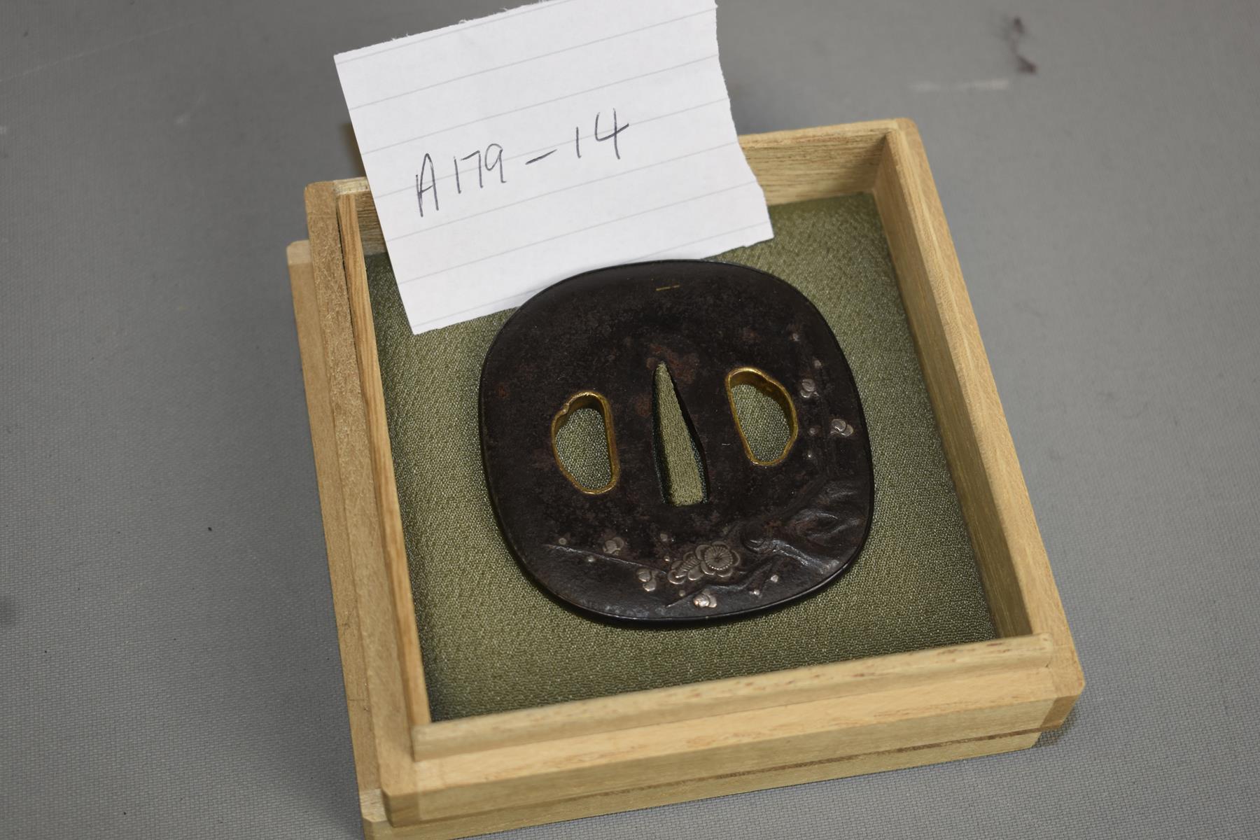 A ROUNDED SQUARE IRON TSUBA, decorated with prunus blossom in silver, gold lined hitsu-ana, - Image 2 of 4