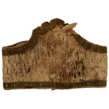 A VERY RARE 19TH CENTURY INDIAN RAJPUT FABRIC BODY ARMOUR, of characteristic cummerbund form, the