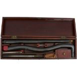 A CASED ANTIQUE AIR CANE, 18inch sighted lacquered body with rifled brass insert, the reservoir of