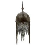 A 19TH CENTURY INDO-PERSIAN KULAH KHUD OR HELMET, the iron bowl etched overall with flowering