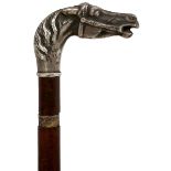A 19TH CENTURY SWORD STICK, the white metal pommel in the form of a bridled horse's head, 54.5cm