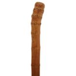 A 19TH CENTURY GERMAN SWORD STICK, bamboo root handle and haft, restored and relacquered, 70.5cm