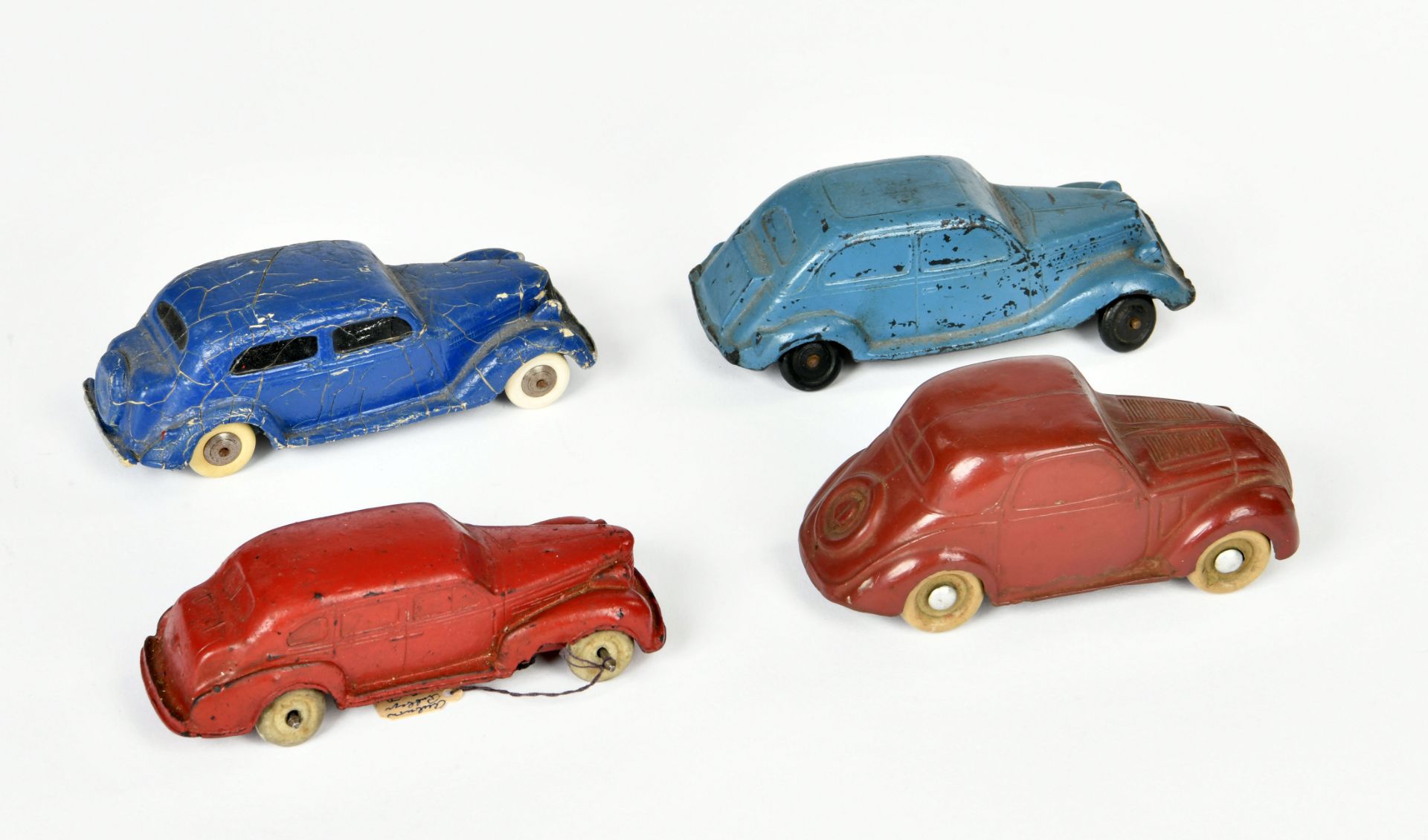 Auburn a.o., 4 rubber cars, USA a.o., 12-14 cm, paint d.