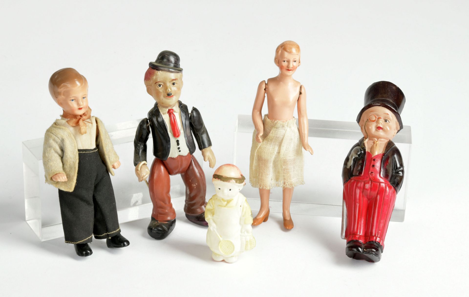 5 figures, puppets, celluloid a.o., 7-12cm, C 1-