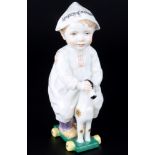 Meissen Hentschelkind auf Holzpferd 1.Wahl, Hentschel child on wooden horse 1st choice,