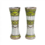 A pair of vases-buds of gilded silver and guilloché enamel, early 20th century.