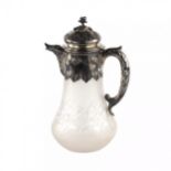 Silver water jug with engraved glass.