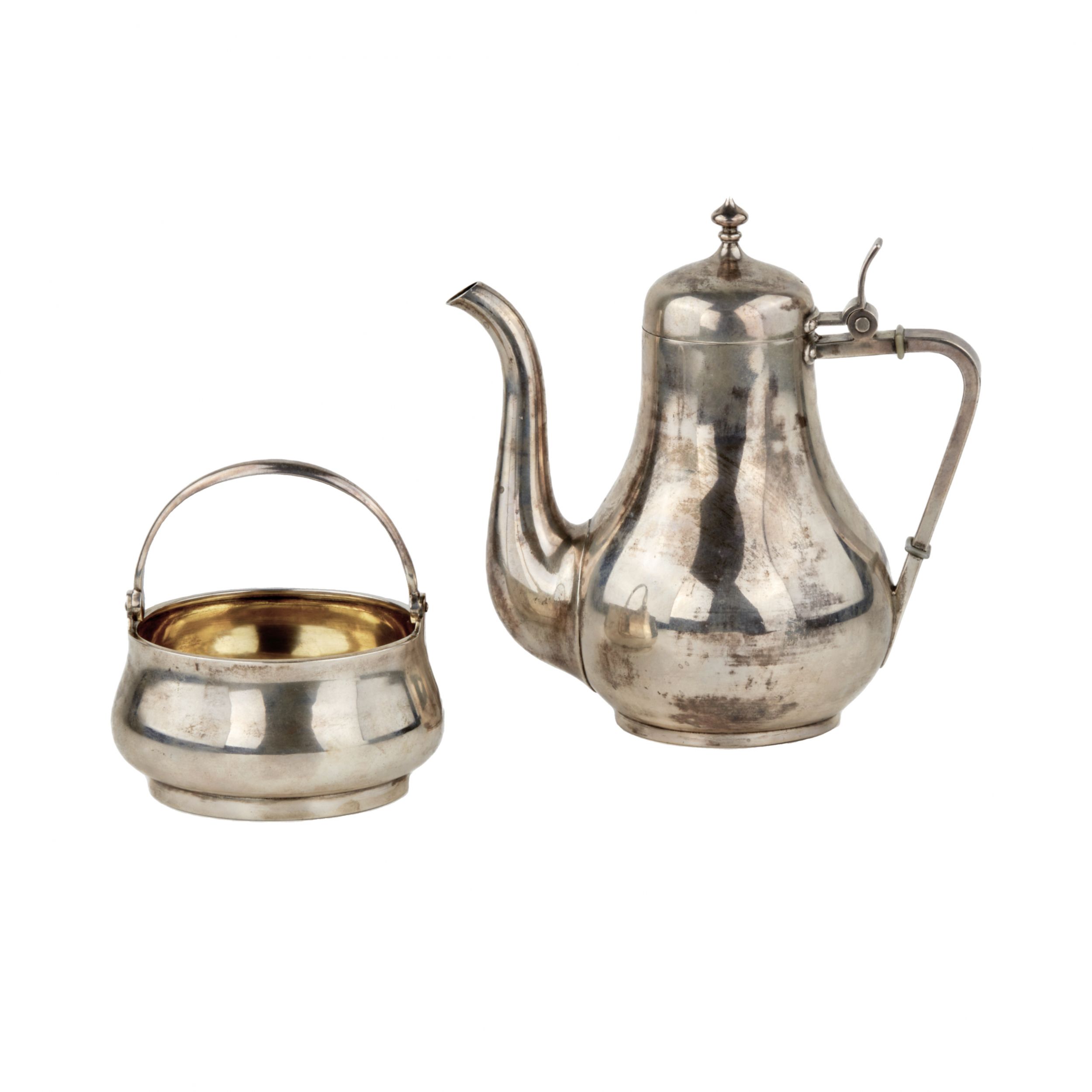 Silver teapot and sugar bowl by P. Ovchinnikov.