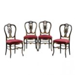 Four Napoleon III style chairs.