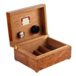 Humidor with musical mechanism by Reuge Music.