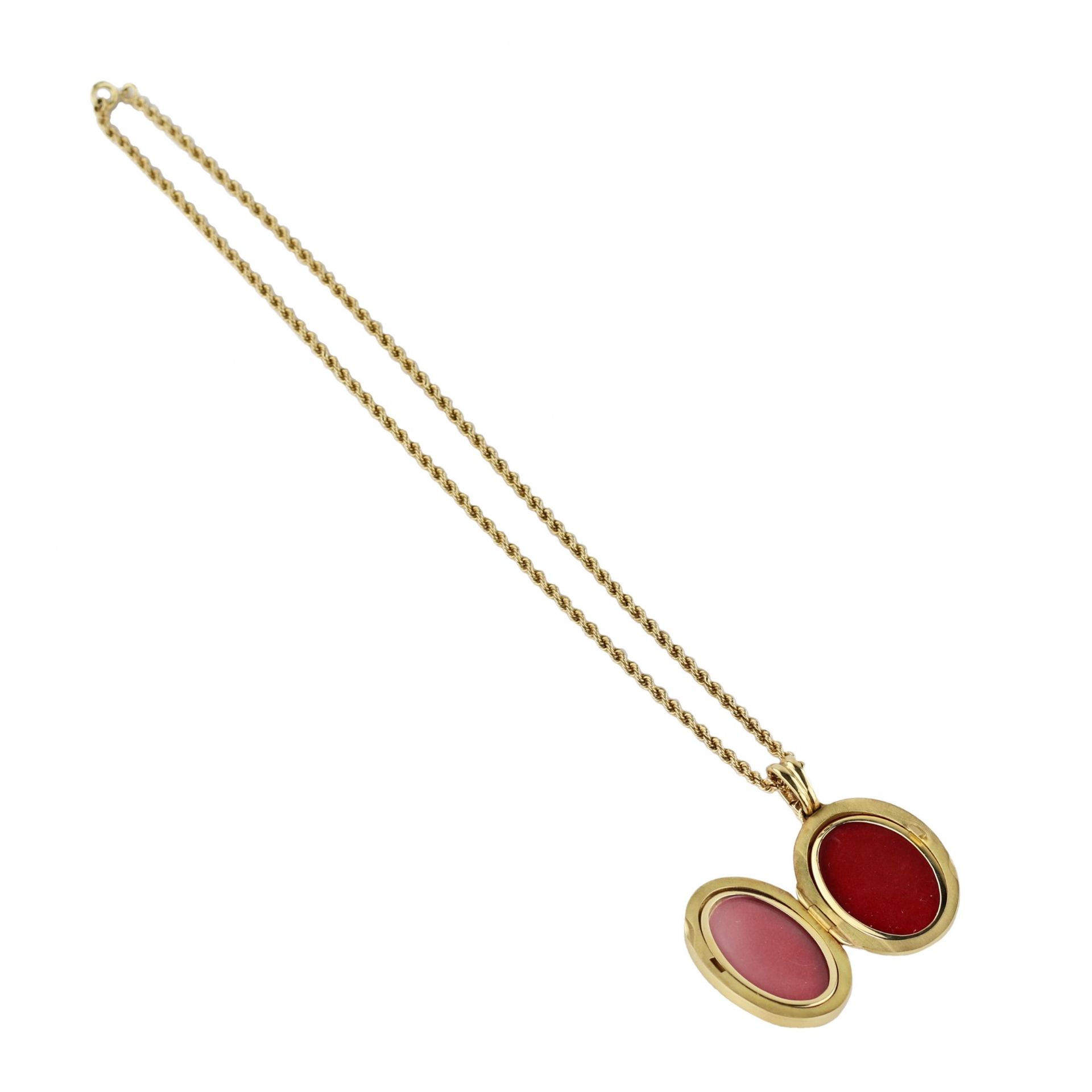 Gold pendant on a chain with a ruby, in the original case. Faberge, France. - Bild 4 aus 8
