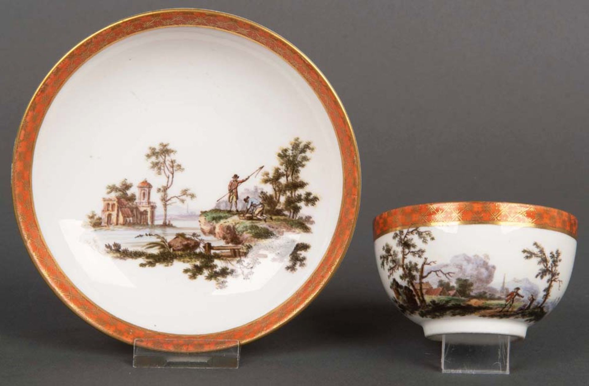 Tasse mit Unterschale. Meissen 1784-1814. Porzellan, bunt bemalt mit Landschaften und