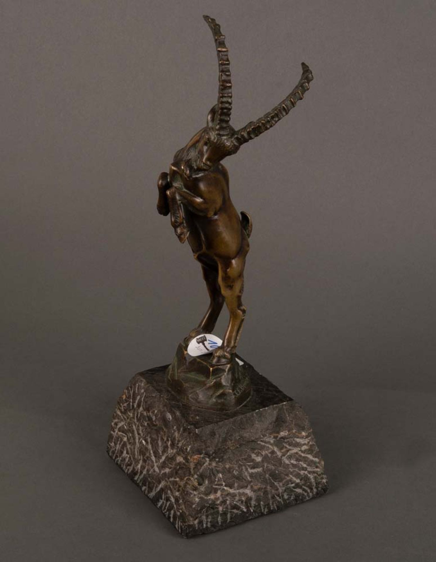Erich Saalmann (1918-1932). Steigender Steinbock. Bronze, auf Marmorsockel, verso sign., H=37 cm.