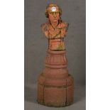 Männerbüste auf Sandsteinsockel. Keramik, bez. mit „Schiller“, H=71 cm. (besch.) **