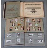 Zwei Klebealben mit Nachkriegsmotiven 1918-1934. Dazu ein Album „Bunte Filmbilder, Album 7 und