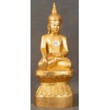 Buddha. Asien. Holz, geschnitzt, vergoldet, H=84 cm, B=31 cm, T=23 cm. **