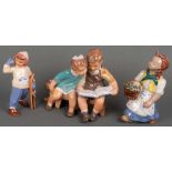 Drei Kinderfiguren. Böhmen 20. Jh. Keramik, bunt bemalt, H=20 bis 24 cm.