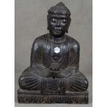 Sitzender Buddha. Asien. Holz, geschnitzt, auf Sockel, H=55 cm.