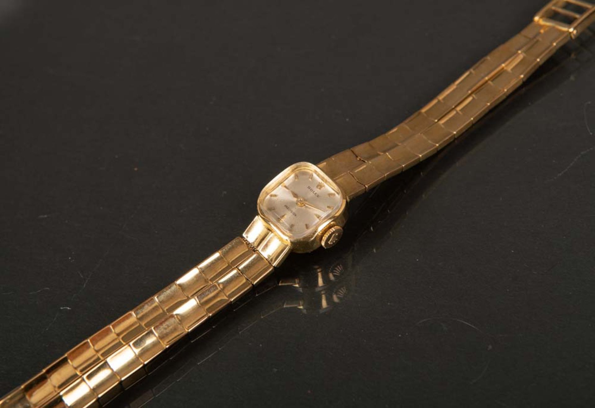 Damenarmbanduhr. Rolex. 18 ct Gold, ca. 31 g, Handaufzug. (Funktion ungeprüft)