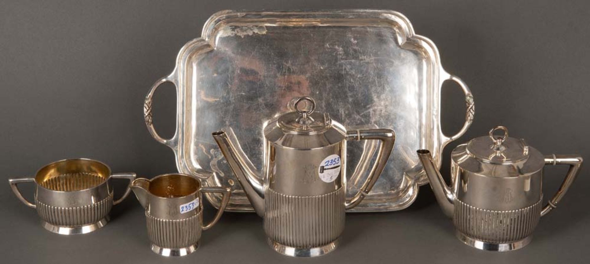 Fünftlgs. Kaffee-/Teeservice mit Tablett. Deutsch 20. Jh. 800er Silber, ca. 1.300 g, H=2,5 cm bis 17