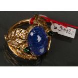 Ring. 18 ct Gold, ca. 19 g. Besetzt mit Tansanit, Turmalinen und Brillanten, ca. 0,50 ct,