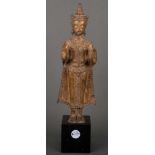 Stehender Buddha. Asien. Bronze, auf Holzsockel, H=52,5 cm.