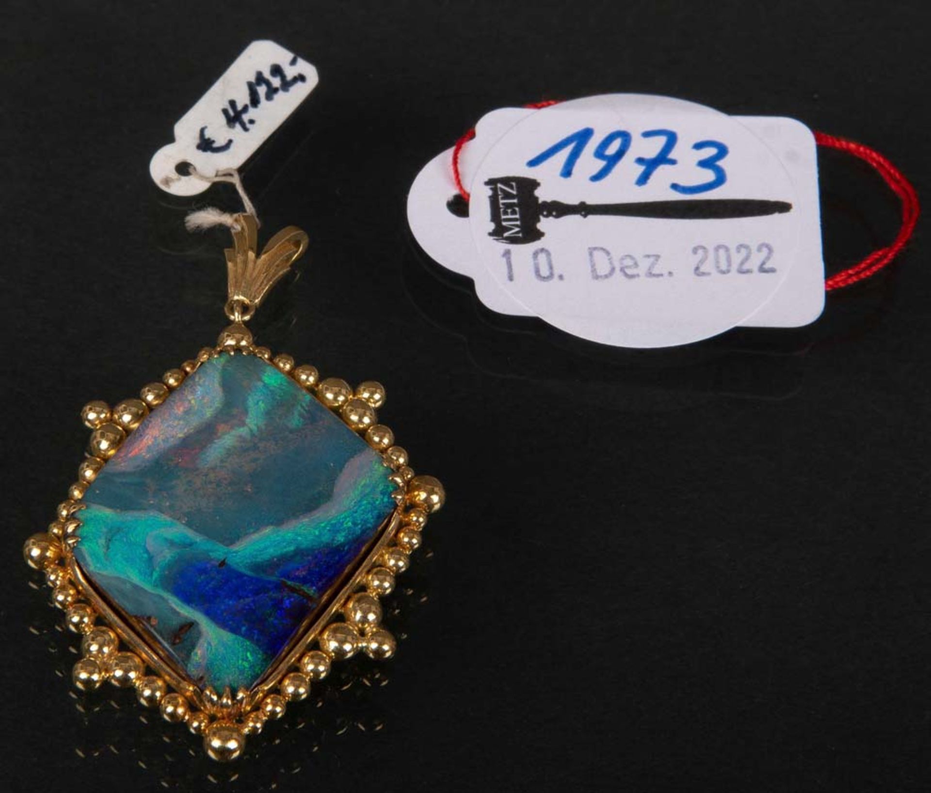 Anhänger. 18 ct Gold, ca. 19 g. Besetzt mit Boulder-Opal.