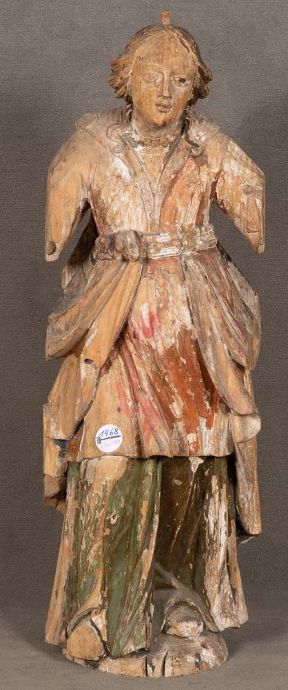 Weibliche Heiligenfigur. Deutsch 18./19. Jh. Holz, geschnitzt, Reste alter Fassung. H=72 cm. (