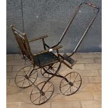 Kinderwagen. Deutsch um 1900. Holzrahmen, auf Metallgestell, H=75 cm, L=75 cm, B=35 cm. >>> Bitte