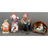 Vier Kinderfiguren. Wien, Goebel, Heubach u.a., 20. Jh.. Keramik / Feinsteinzeug / Porzellan,