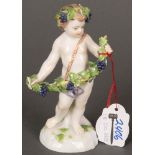 Putto, den Herbst symbolisierend. Meissen 19. Jh. Porzellan, bunt bemalt, am Boden